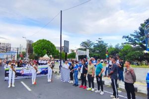 Polsek Sario Amankan Kirab Poltekpel Sulut